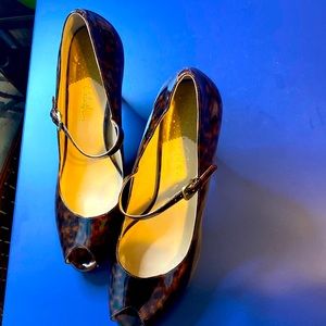 Cole Haan animal print peep toe heels with Nike Air Technology size 11. Slip on.